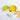 Tri-color slow feeder dog bowl (green, yellow, and white) with raised paw-shaped ridges. Designed to slow down eating, promote digestion, and prevent bloating in dogs.